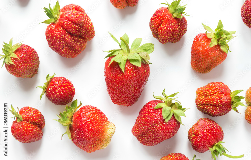 Ripe strawberries isolated on the white background