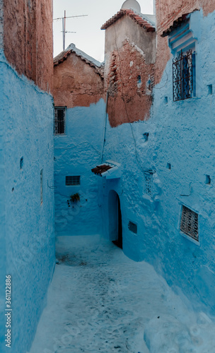 Street with stairs in Medina of Chefchaouen, Morocco. Chefchaouen or Chaouen is known that the houses in this old town are painted in the striking, variously blue hued  © Mbkphotographer