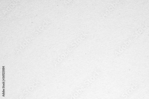 White cardboard paper or white concrete / cement wall. Background texture christmas festival, copy space for text.