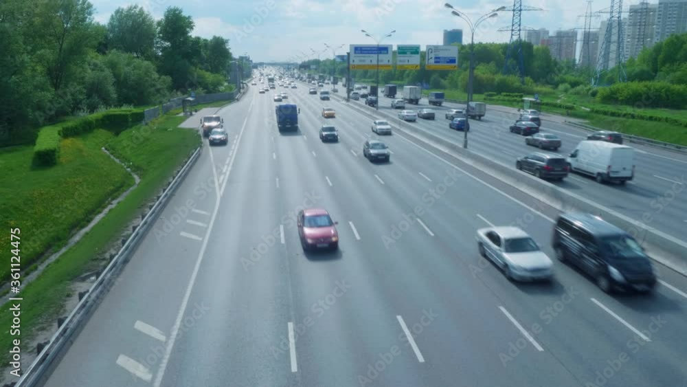 Up view of traffic on Moscow ring highway from the bridge above it. Environment polution. Up view of traffic on Moscow ring highway from the bridge above it. Environment polution.