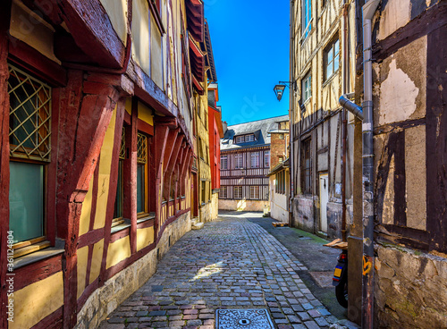 Fototapeta Naklejka Na Ścianę i Meble -  Street with timber framing houses in Rouen, Normandy, France. Architecture and landmarks of Rouen. Cozy cityscape of Rouen