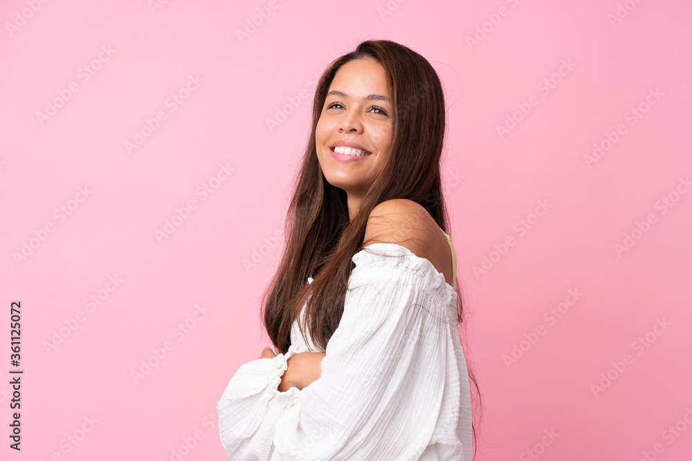 Young Brazilian girl over isolated pink background happy and smiling Young Brazilian girl over isolated pink background happy and smiling