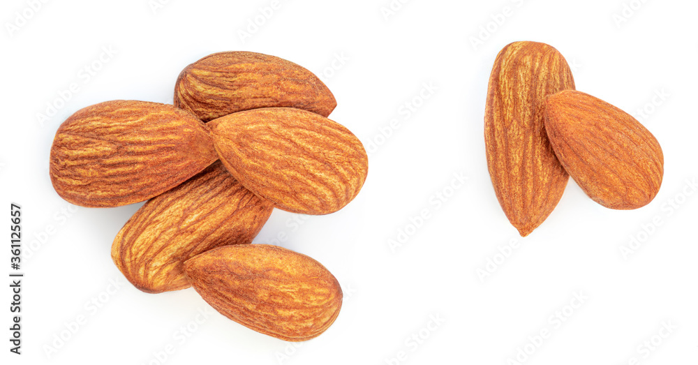 Almond Nuts. Closeup of almonds isolated on the white background. Flat lay Almond Nuts. Closeup of almonds isolated on the white background. Flat lay