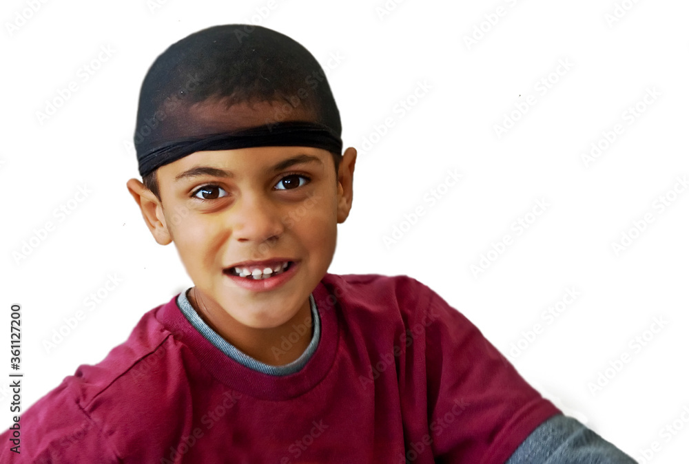 This is a cute 9 year old bi-racial boy, wearing a black hair net on his head. He is wearing a burgundy colored tee shirt, and is isolated on a white background. This is a cute 9 year old bi-racial boy, wearing a black hair net on his head. He is wearing a burgundy colored tee shirt, and is isolated on a white background.