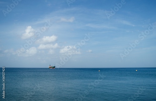 Ship anchored in the middle of the ocean