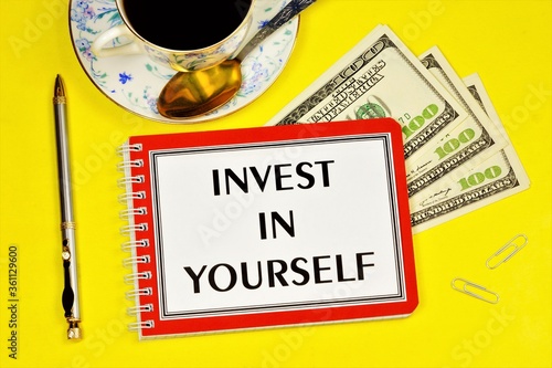 Invest in yourself-text inscription on the planning notebook. placement of capital for the purpose of obtaining financial profit or knowledge in education.