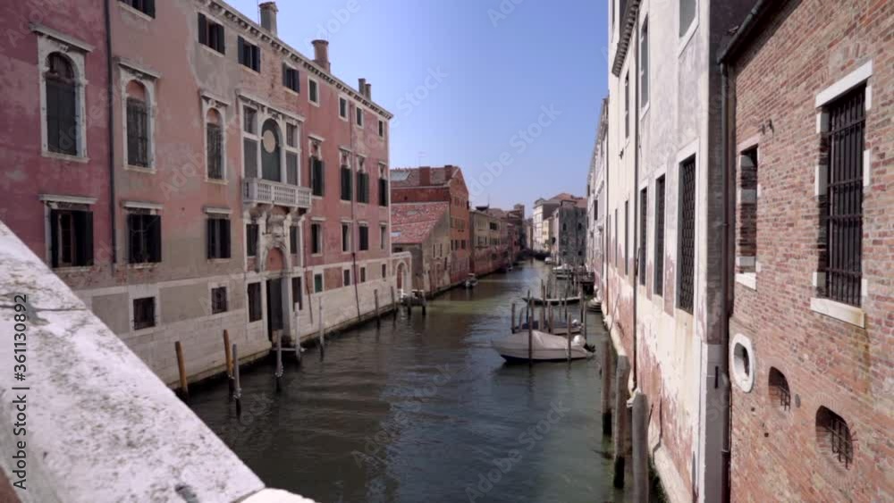 Boats float on one of the many back canals in Venice in Italy surrounded by old colorful traditional buildings while tourists roam the narrow streets.
Italy, Europe Boats float on one of the many back canals in Venice in Italy surrounded by old colorful traditional buildings while tourists roam the narrow streets.
Italy, Europe