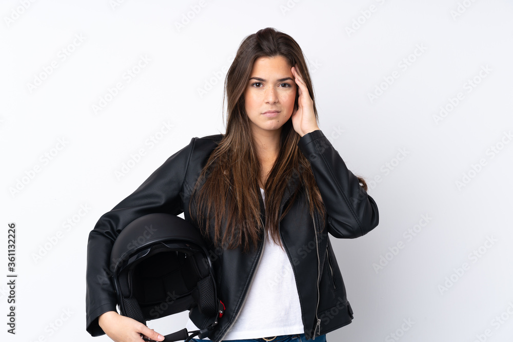 Young woman with a motorcycle helmet over isolated white background unhappy and frustrated with something. Negative facial expression Young woman with a motorcycle helmet over isolated white background unhappy and frustrated with something. Negative facial expression