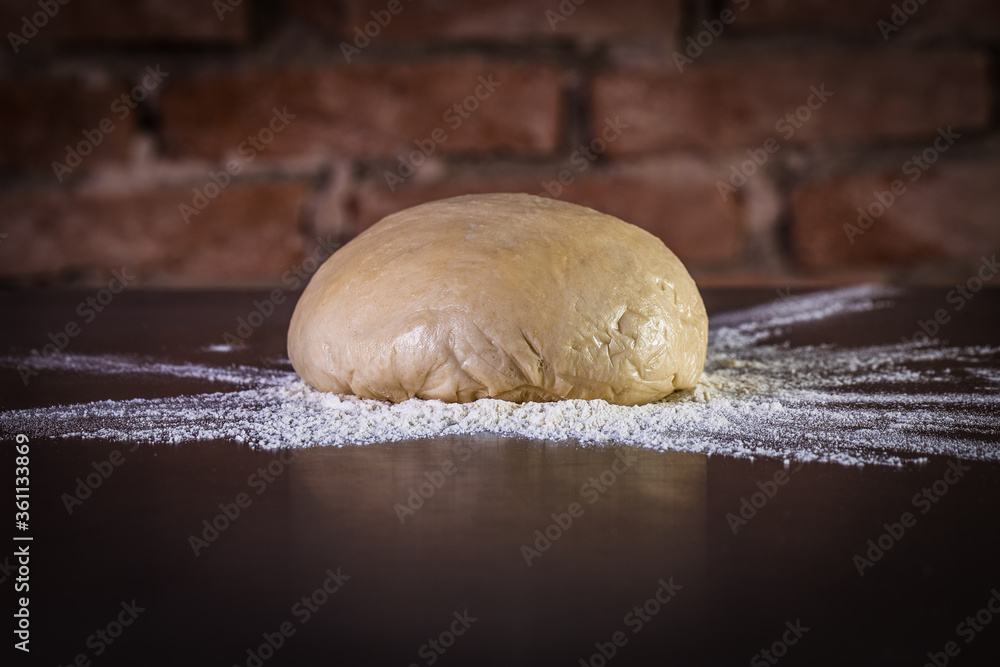 Fresh raw dough for pizza ready to be prepared Fresh raw dough for pizza ready to be prepared