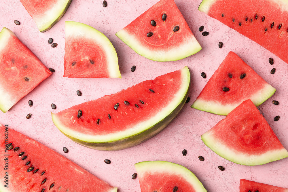 Composition with watermelon slices on pink background, top view Composition with watermelon slices on pink background, top view