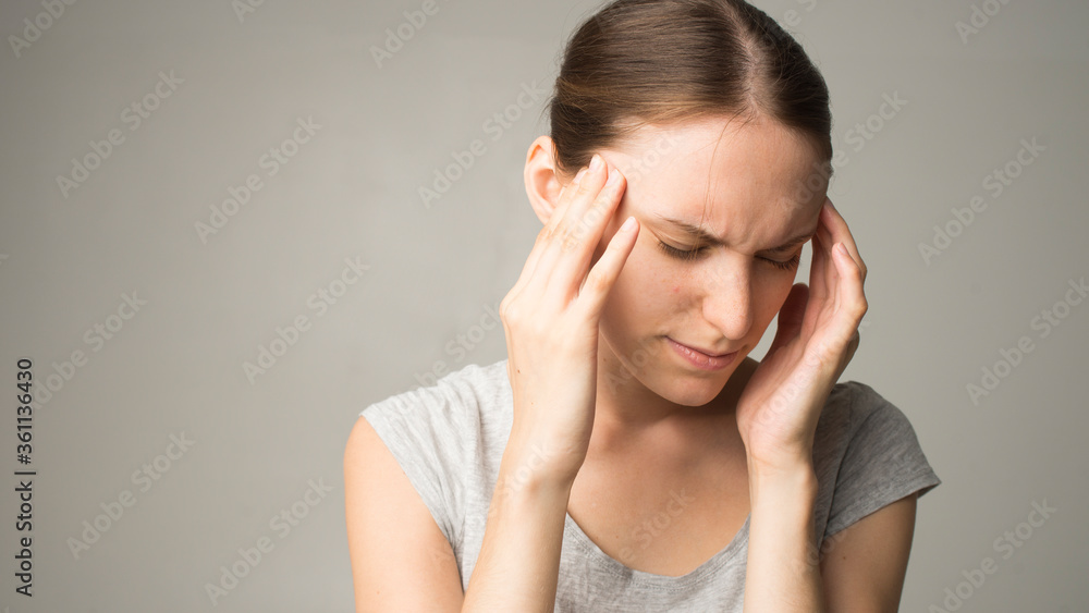 Young beautiful woman having headache Young beautiful woman having headache