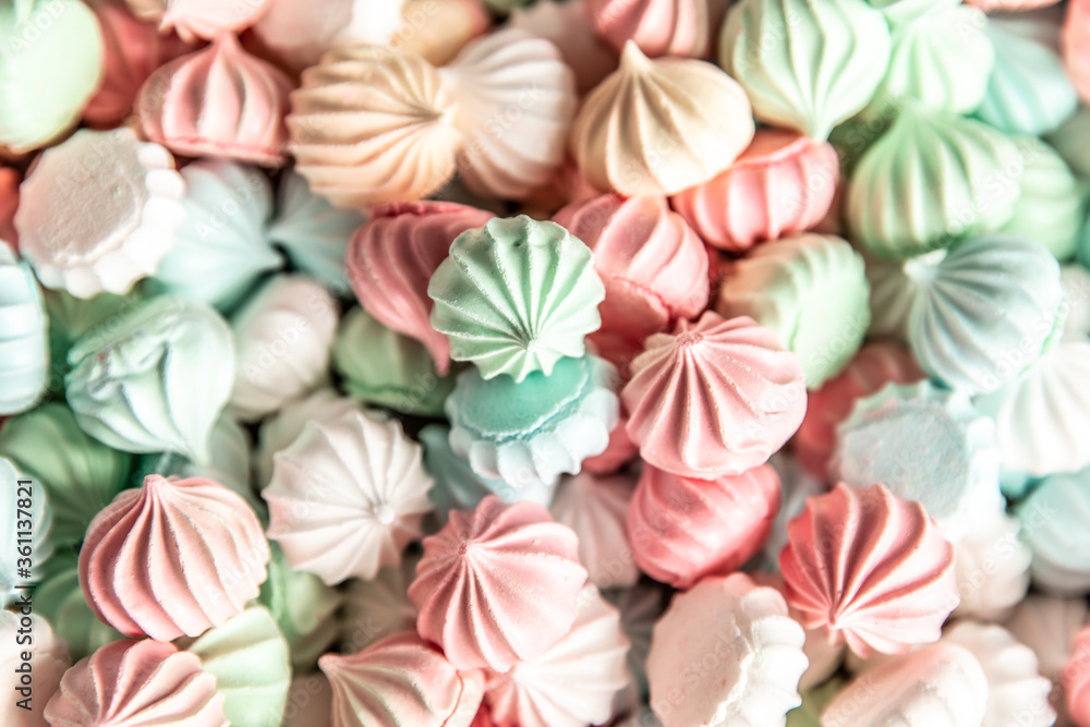 Close up of a batch of meringues. background and texture, a lot of marshmallows. A large of meringues sweets. background Close up of a batch of meringues. background and texture, a lot of marshmallows. A large of meringues sweets. background