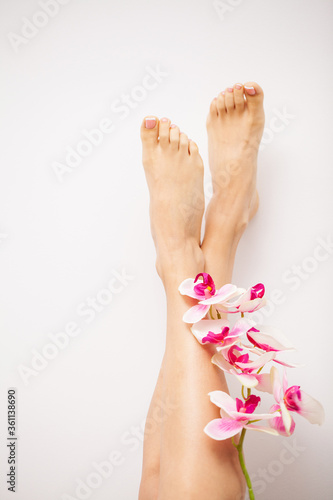 Long female legs with beautiful smooth skin, leg care concept and hair removal