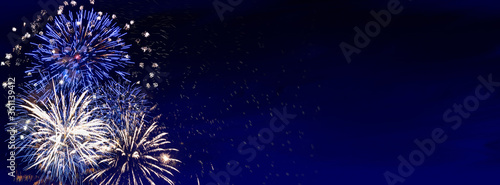 Photos Fireworks, colorful sylvester-fireworks on blue background with sparks and space