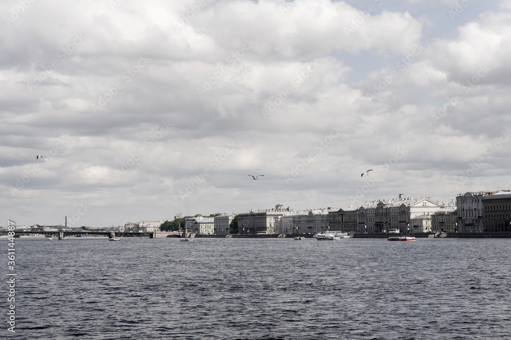 cumulus clouds and waves on the Neva river in St. Petersburg