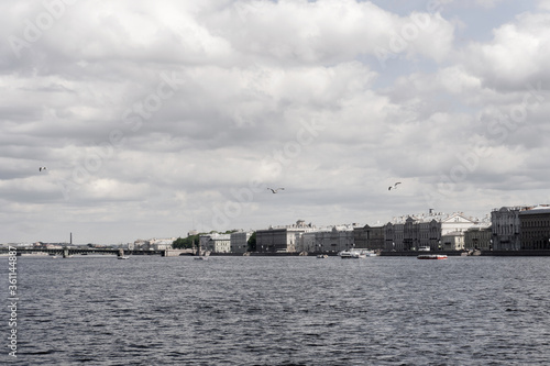 cumulus clouds and waves on the Neva river in St. Petersburg