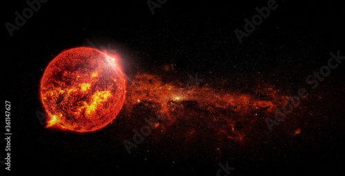 Sun on space background. Elements of this image furnished by NASA.
