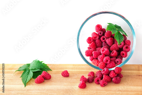 Fresh raspberries on white background