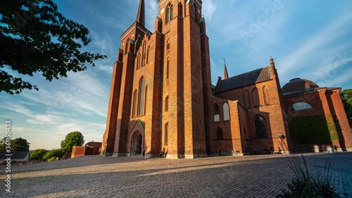 Tilting Time Lapse clip from Roskilde Cathedral at the golden hour at summer photo