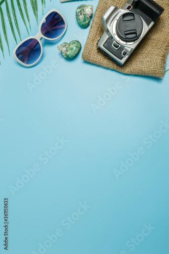 The beach accessories on the blue and blue background. Summer sale beautiful web banner.