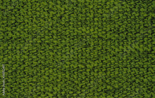 Green fabric texture. Textile background. The background is suitable for design and 3D graphics