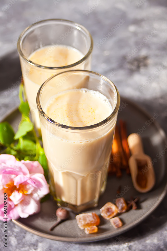 masala tea chai with milk and spices. masala tea chai with milk and spices.