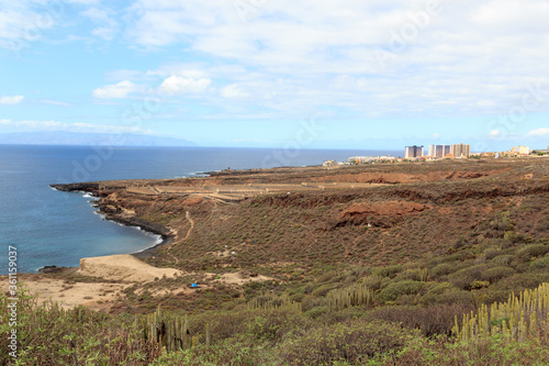 Coastline with cliffs at beach Playa de Diego Hernandez on Canary Island Tenerife, Spain