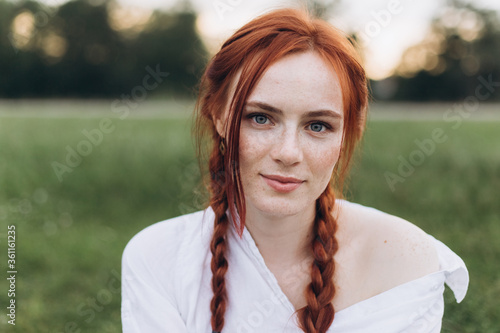 Close up beautiful woman portrait natural face freckles casual female portrait lifestyle beauty girl with pigtails