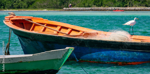 Wallpaper Mural old fishing boat in a tropical colorful scenario Torontodigital.ca