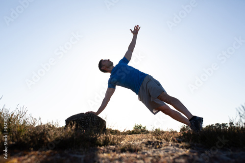 Man doing exercise in the countryside