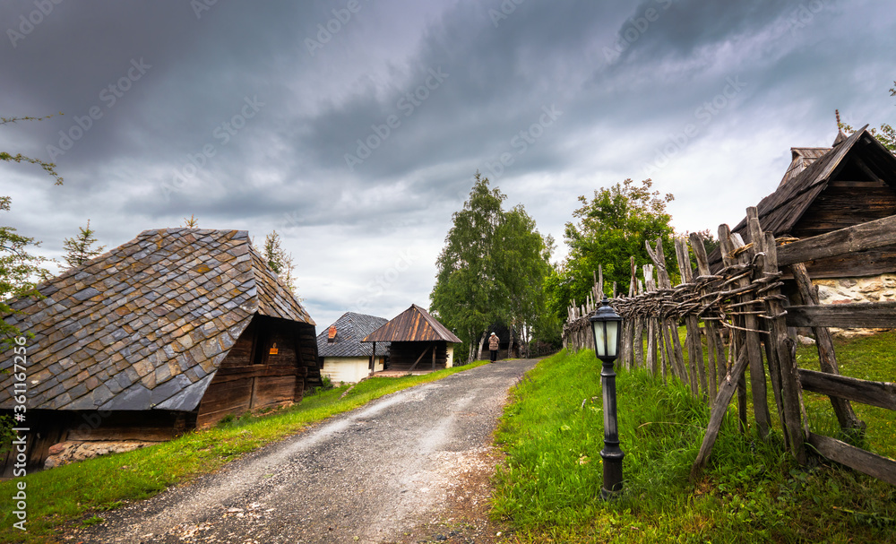 Old wooden rustic idyllic houses in a Sirogojno village on Zlatibor mountain in Serbia. Old wooden rustic idyllic houses in a Sirogojno village on Zlatibor mountain in Serbia.