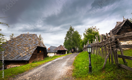 Old wooden rustic idyllic houses in a Sirogojno village on Zlatibor mountain in Serbia.