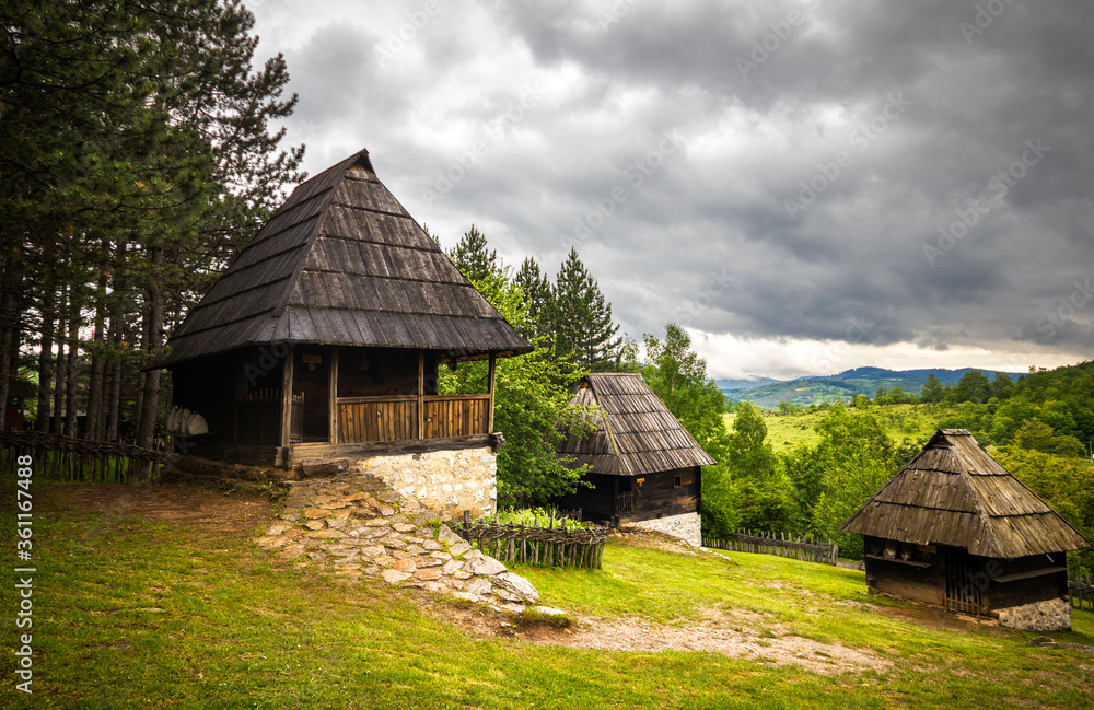 Old wooden rustic idyllic houses in a Sirogojno village on Zlatibor mountain in Serbia.