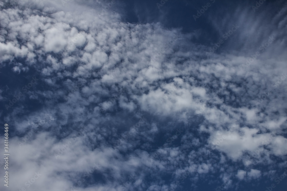 Obraz premium Clouds on the blue sky. Background, texture.