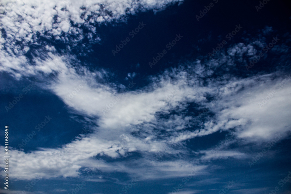 Clouds on the blue sky. Background, texture.