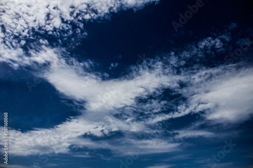 Clouds on the blue sky. Background, texture.