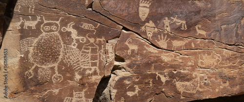 Native American Indian rock art petroglyph owl panel panorama 1409. Nine Mile Canyon, Utah. World’s longest art gallery of ancient native American, Indian rock art, hieroglyphs, pictographs.