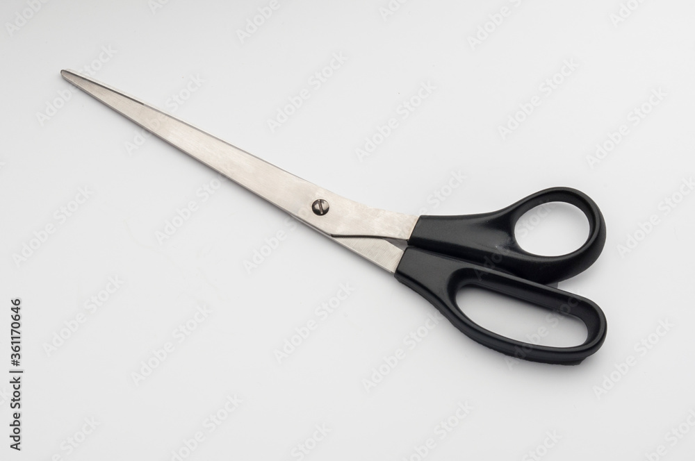 closed big scissors, isolated, on white background closed big scissors, isolated, on white background