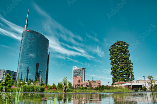 Panoramic view of the UniCredit Tower and Vertical Forest, Bosco Verticale skyscrapers from the Library Of Trees park, Parco Biblioteca degli Alberi Milano - BAM photo