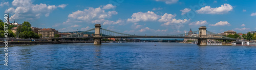 A panorama view of the Chain Bridge across the River Danube in Budapest during summertime