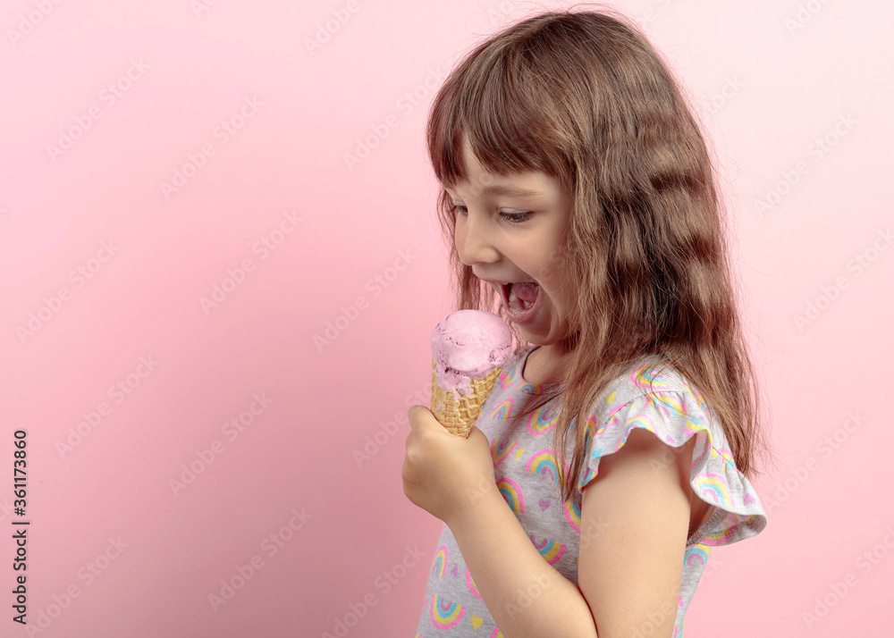 Happy little girl with delicious ice cream against pink background. Happy little girl with delicious ice cream against pink background.