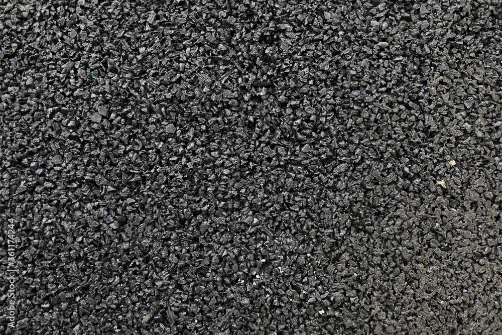 Black colored granulated material texture Black colored granulated material texture