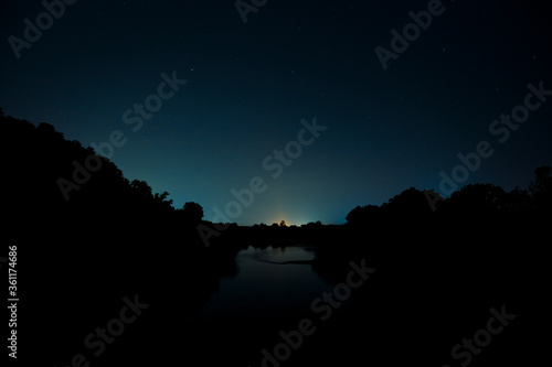 night view of the ohio river with reflections