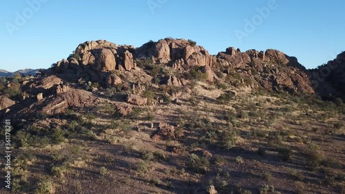 4K aerial drone video of African savanna hills, large red granite boulders range near B1 highway south of Windhoek in central highland Khomas Hochland of Namibia, southern Africa