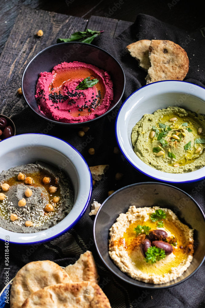 Traditional hummus with different flavours Traditional hummus with different flavours