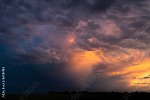 Storm clouds at dusk creating layers in the sky