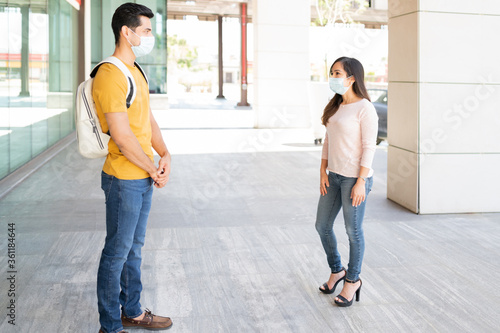 Couple Talking With Each Other During Coronavirus © AntonioDiaz