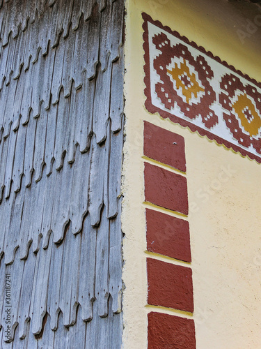 A corner of a wood and plaster house in Ciocianesti, Romania photo