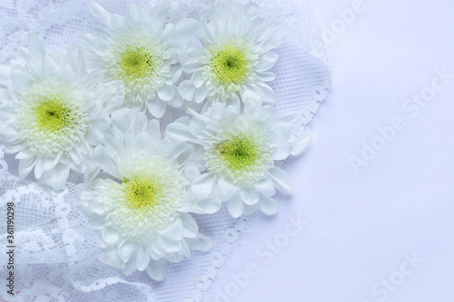 card for invitation or congratulation with flowers. wedding bouquet with blank card. white chrysanthemum flowers