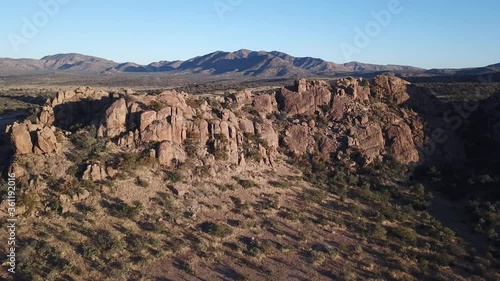 4K aerial drone video of African savanna hills, large red granite boulders range near B1 highway south of Windhoek in central highland Khomas Hochland of Namibia, southern Africa